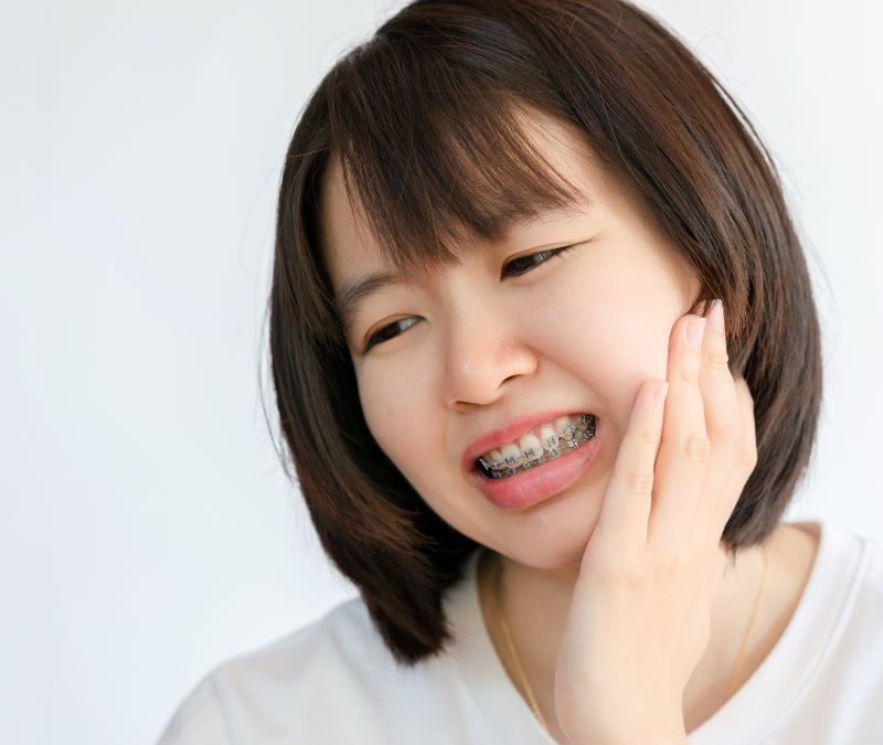 Woman with an orthodontic emergency